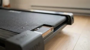 Close-up of a treadmill running deck showing shock absorption.