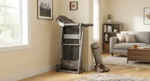 A space-saving gentle exercise treadmill folded up neatly against a wall in a Canadian household.