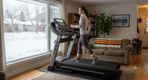 A sturdy walking treadmill set up in a Canadian living room for daily cardio workouts during winter.